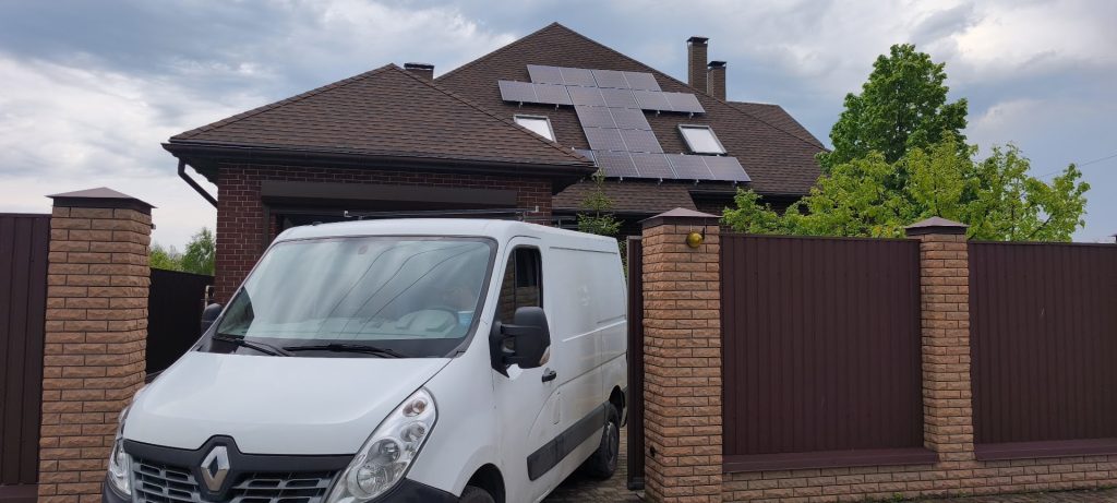a white van parked in front of a house
